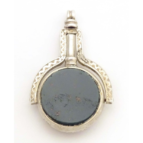 787 - A Victorian silver pendant fob seal / pocket watch key, with central rotating bloodstone and carneli... 