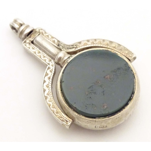 787 - A Victorian silver pendant fob seal / pocket watch key, with central rotating bloodstone and carneli... 