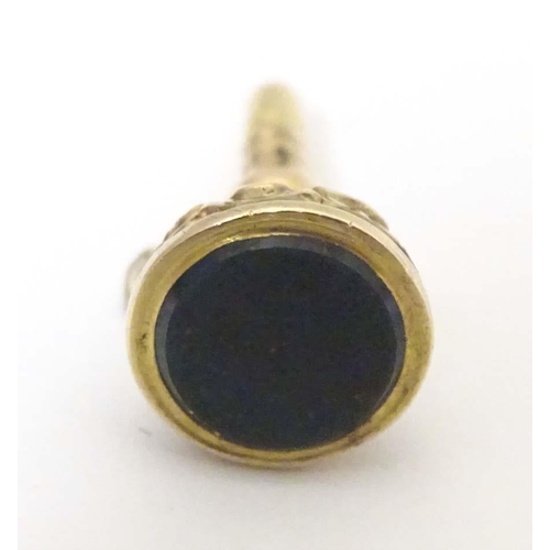 788 - A Victorian yellow metal pendant watch key fob seal with bloodstone seal to one end and pocket watch... 