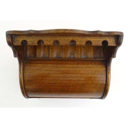 1066 - An early 20thC oak smokers companion / box with silver plate mounts, tambour front with a single fit... 