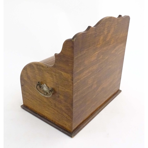 1066 - An early 20thC oak smokers companion / box with silver plate mounts, tambour front with a single fit... 