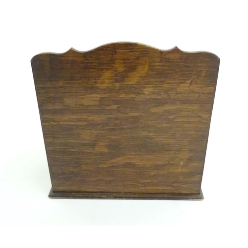 1066 - An early 20thC oak smokers companion / box with silver plate mounts, tambour front with a single fit... 