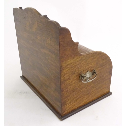 1066 - An early 20thC oak smokers companion / box with silver plate mounts, tambour front with a single fit... 