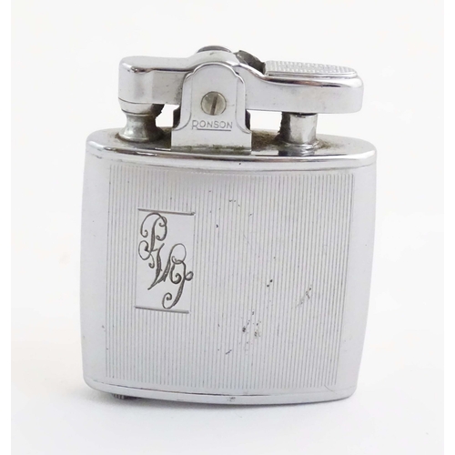 1068 - A mid 20thC cased Ronson Standard lighter, in chromed finish. Approx. 2 1/8