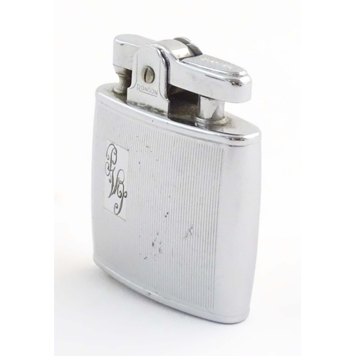 1068 - A mid 20thC cased Ronson Standard lighter, in chromed finish. Approx. 2 1/8