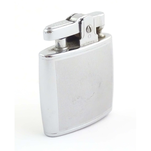 1068 - A mid 20thC cased Ronson Standard lighter, in chromed finish. Approx. 2 1/8