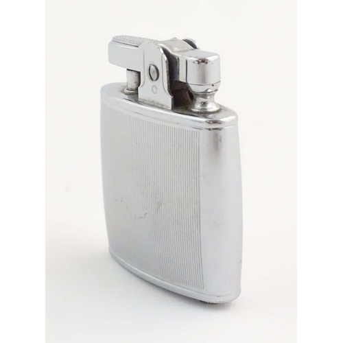 1068 - A mid 20thC cased Ronson Standard lighter, in chromed finish. Approx. 2 1/8