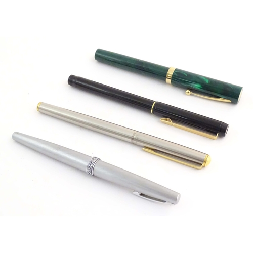 1068A - A mid to late 20thC presentation cased Win International lighter and ballpoint pen set, together wit... 