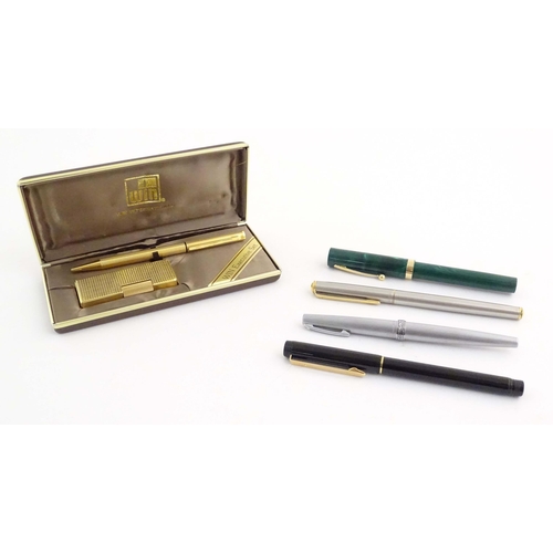 1068A - A mid to late 20thC presentation cased Win International lighter and ballpoint pen set, together wit... 