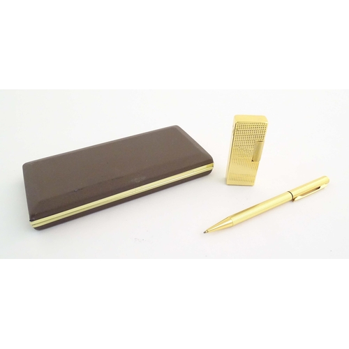 1068A - A mid to late 20thC presentation cased Win International lighter and ballpoint pen set, together wit... 