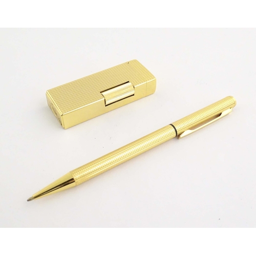 1068A - A mid to late 20thC presentation cased Win International lighter and ballpoint pen set, together wit... 