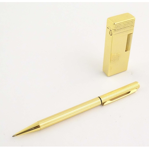 1068A - A mid to late 20thC presentation cased Win International lighter and ballpoint pen set, together wit... 