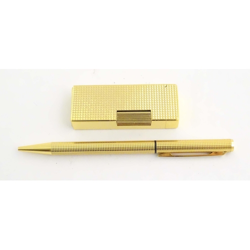 1068A - A mid to late 20thC presentation cased Win International lighter and ballpoint pen set, together wit... 