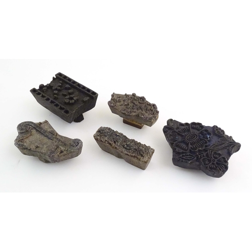 1081 - Five assorted carved wooden printing blocks with floral and foliate decoration. Largest approx. 7 1/... 