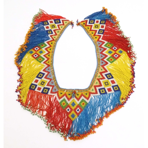 1085 - A quantity of Africa / Maasai beaded jewellery to include necklaces, bracelets, etc.