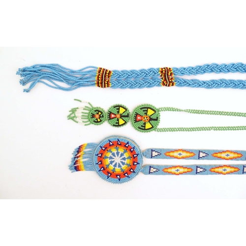 1086 - A quantity of assorted Native American bead jewellery to include disc necklaces, bracelets, belts et... 