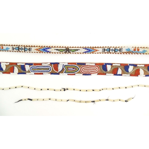 1086 - A quantity of assorted Native American bead jewellery to include disc necklaces, bracelets, belts et... 