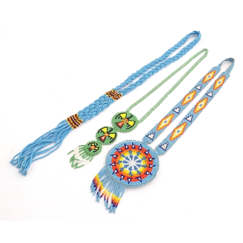 1086 - A quantity of assorted Native American bead jewellery to include disc necklaces, bracelets, belts et... 