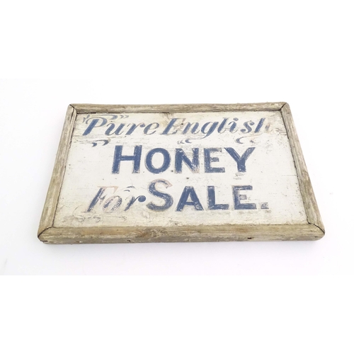 1089 - A 20thC hand painted wooden sign 'Pure English Honey For Sale'. Approx. 9