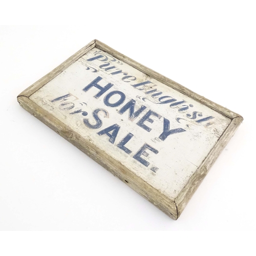 1089 - A 20thC hand painted wooden sign 'Pure English Honey For Sale'. Approx. 9