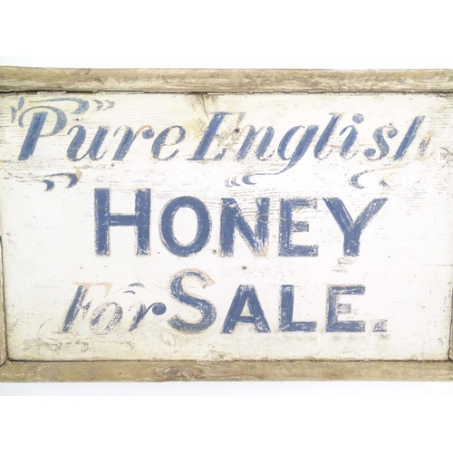 1089 - A 20thC hand painted wooden sign 'Pure English Honey For Sale'. Approx. 9