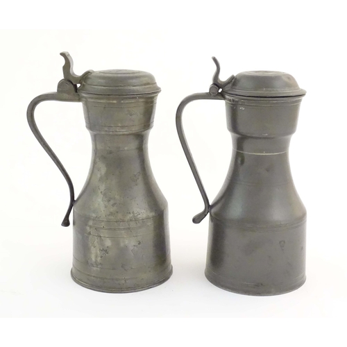 1102 - Four items of 19thC pewter, comprising two tygs, each approx. 8 3/8