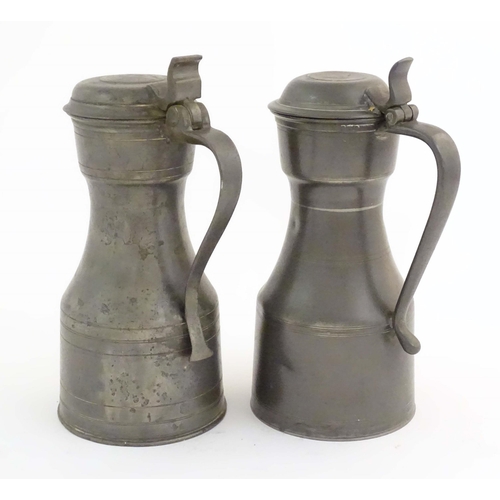 1102 - Four items of 19thC pewter, comprising two tygs, each approx. 8 3/8