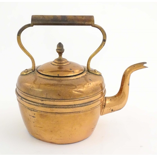 1103 - An early 20thC copper kettle, decorated with banding and acorn finial, approx. 10