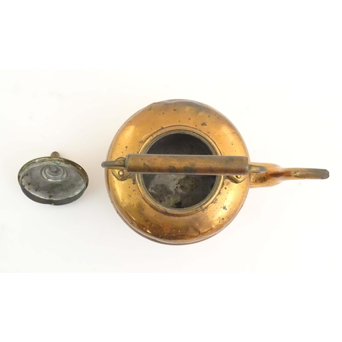 1103 - An early 20thC copper kettle, decorated with banding and acorn finial, approx. 10