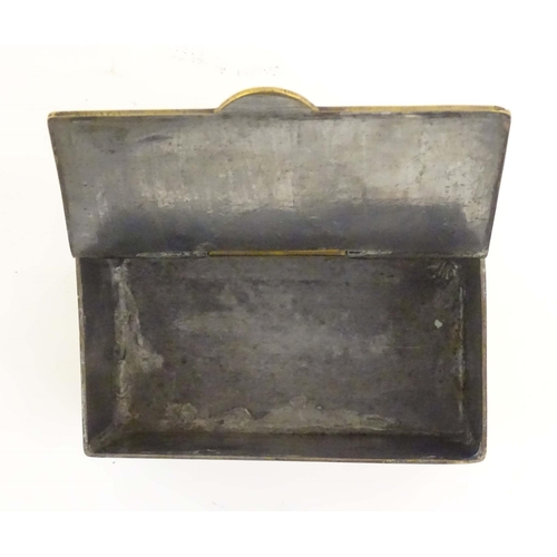 1105 - A mid 20thC brass tea caddy, the hinged lid decorated with the arms of HMS Caledonia (shore establis... 