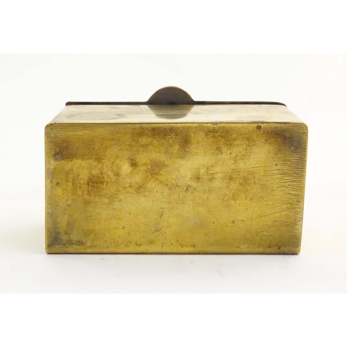 1105 - A mid 20thC brass tea caddy, the hinged lid decorated with the arms of HMS Caledonia (shore establis... 