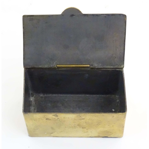 1105 - A mid 20thC brass tea caddy, the hinged lid decorated with the arms of HMS Caledonia (shore establis... 