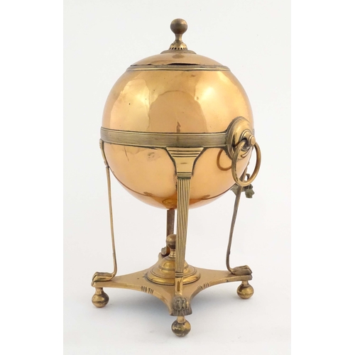 1113 - A 19thC copper samovar with spherical body, banded detail and twin ring handles, raised on four legs... 