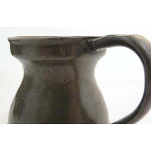 1114 - A quantity of pewter items, comprising two Victorian pint tankards, an early 20thC pint tankard, thr... 