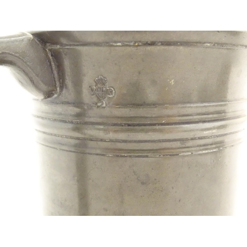 1114 - A quantity of pewter items, comprising two Victorian pint tankards, an early 20thC pint tankard, thr... 