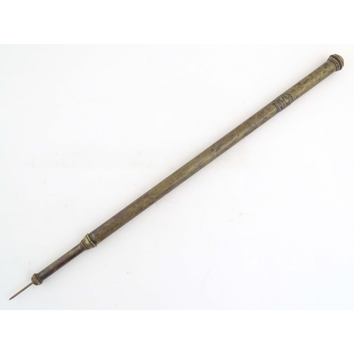 1115 - An early 20thC garden spike / weedkiller syringe, of brass construction and formed as a walking cane... 