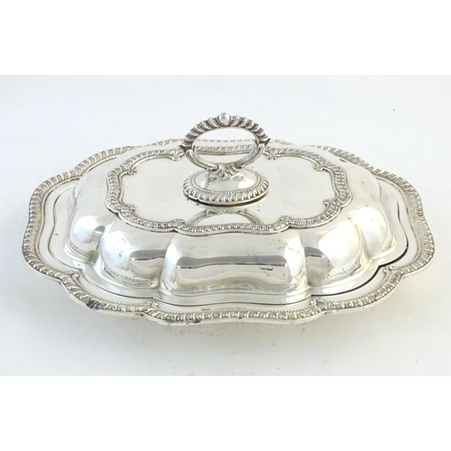 550 - A silver plate serving / entree dish and cover. Approx. 14