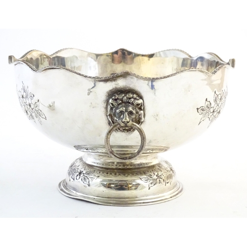 551 - A large silver plate punch bowl and ladle. The punch bowl approx. 12 1/2