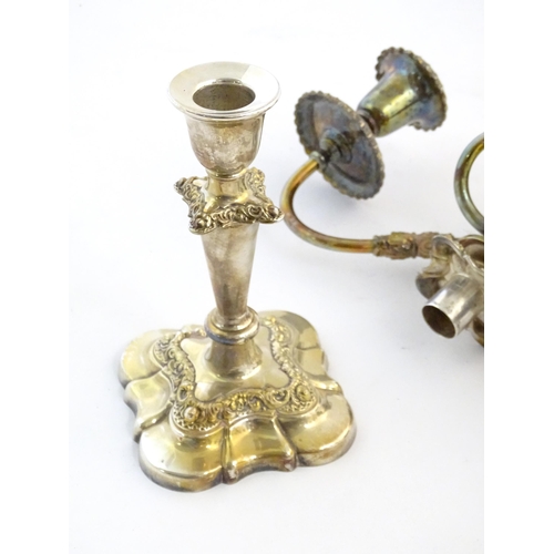 552 - A pair of silver plate candlesticks by Barker Ellis with associated silver plate three branch sconce... 