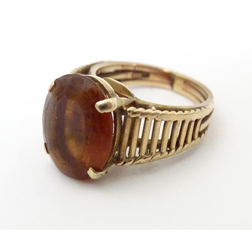 580A - A 9ct gold retro ring set with citrine, hallmarked London 1958, maker HGM. Ring size approx. M 1/2