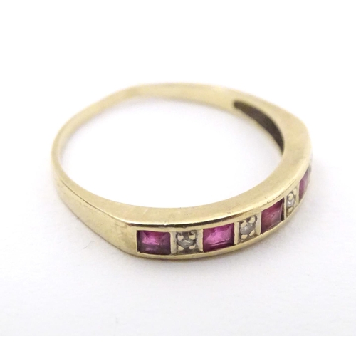 596 - A 9ct gold ring set with rubies and diamonds. Together with a 9ct gold ring set with white stones. R... 