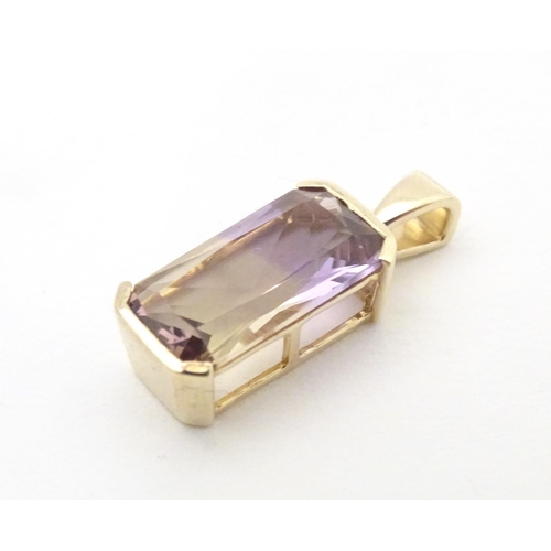 606 - A 9ct gold ring set with central Anahi ametrine flanked by diamonds to shoulders, together with a 9c... 