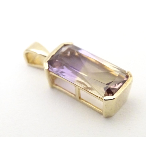 606 - A 9ct gold ring set with central Anahi ametrine flanked by diamonds to shoulders, together with a 9c... 