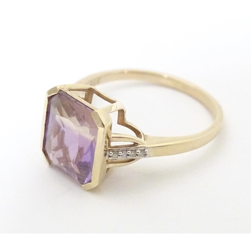 606 - A 9ct gold ring set with central Anahi ametrine flanked by diamonds to shoulders, together with a 9c... 