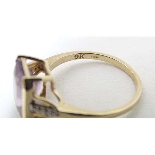 606 - A 9ct gold ring set with central Anahi ametrine flanked by diamonds to shoulders, together with a 9c... 