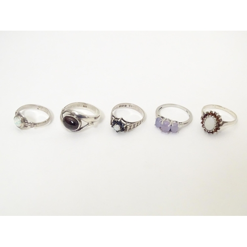 607 - Five assorted silver dress rings (5)