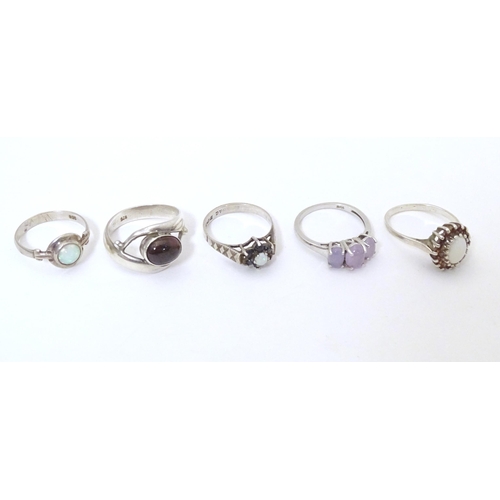 607 - Five assorted silver dress rings (5)