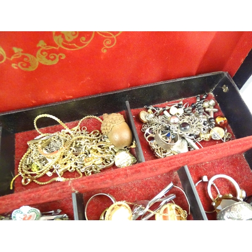 759 - A jewellery box containing assorted costume jewellery together with some silver jewellery, a shell c... 