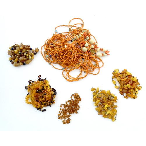 760 - A quantity of assorted bead necklaces to include some amber examples.