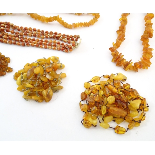 760 - A quantity of assorted bead necklaces to include some amber examples.